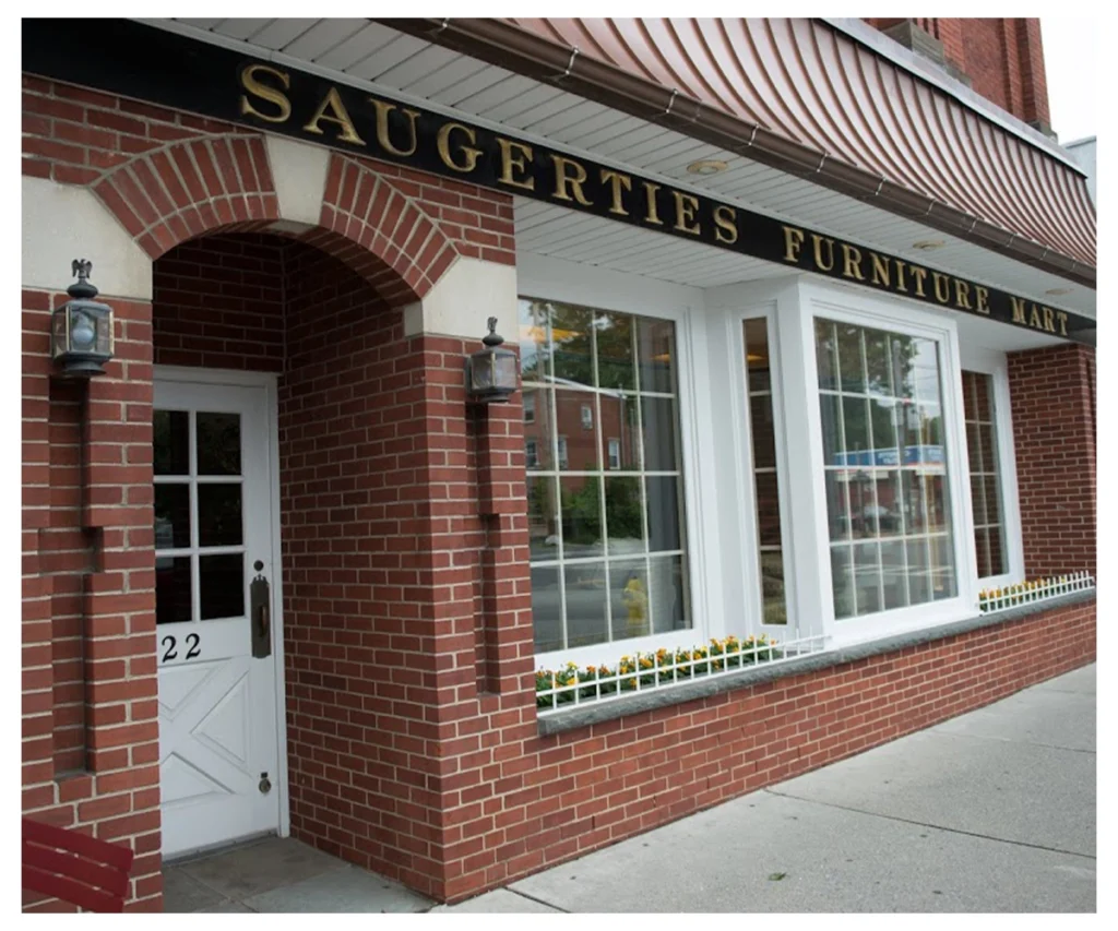 Saugerties Furniture Mart brick storefront with arched entry and large windows